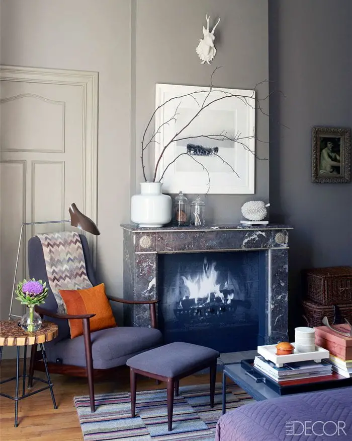 Dark gray walls in master bedroom with marble fireplace via @thouswellblog