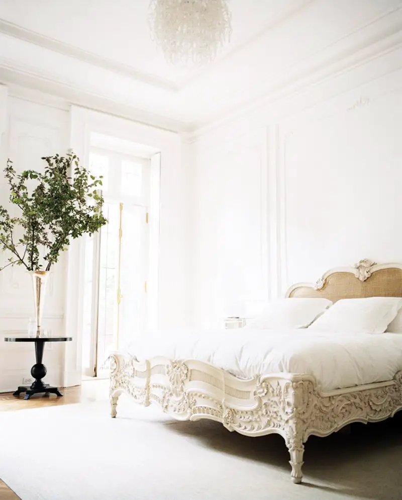 Rococo style bed in simple white bedroom on Thou Swell @thouswellblog