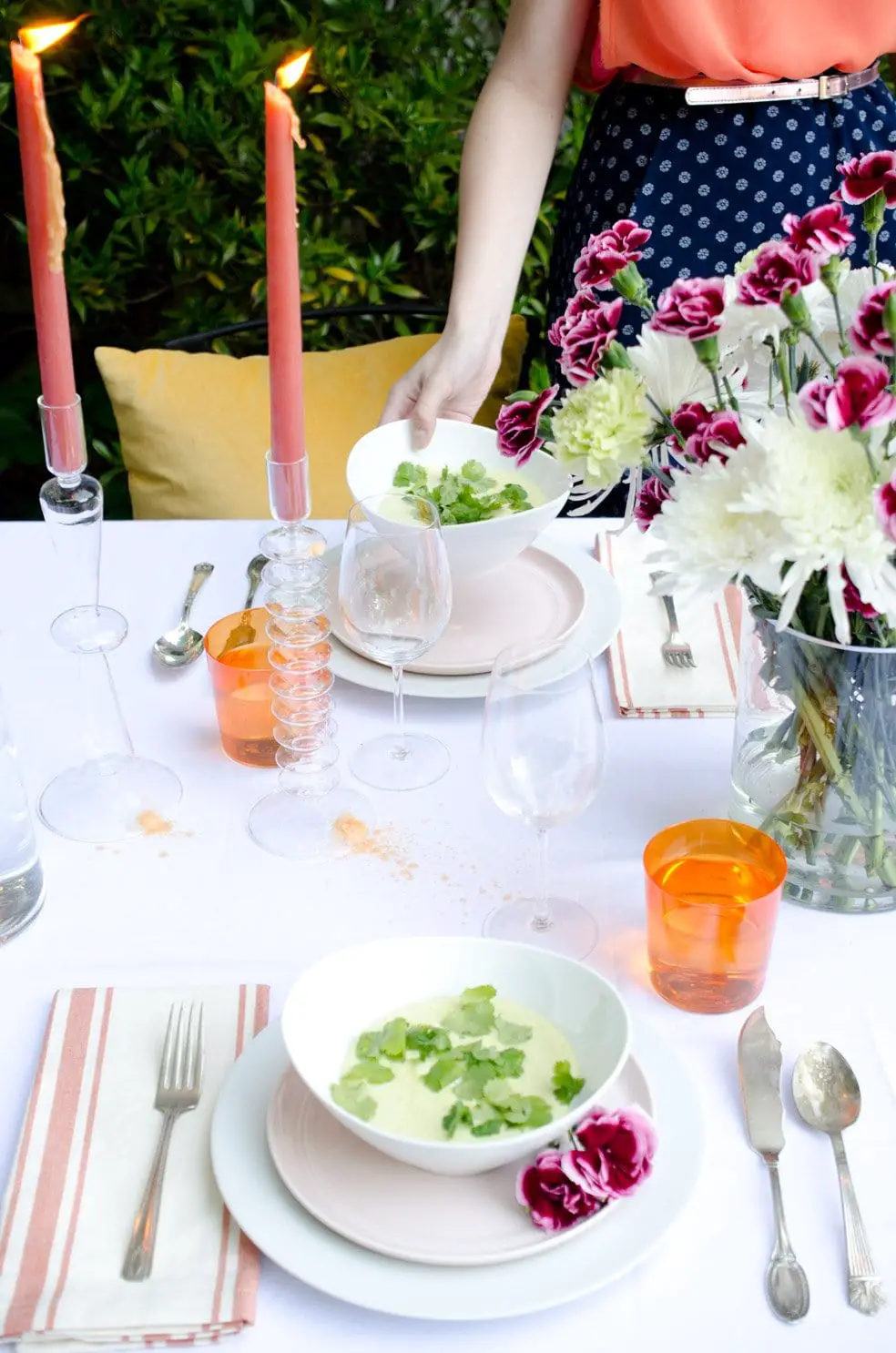 Brighten up your Cinco de Mayo tabletop with pops of orange, yellow and blush, and bring in colored water glasses and striped napkins for some pizazz.