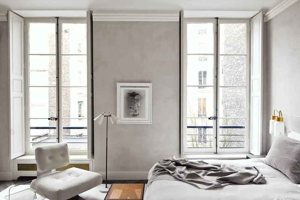 Joseph Dirand's sophisticated Paris apartment redefines minimalism through subtle nuance. 