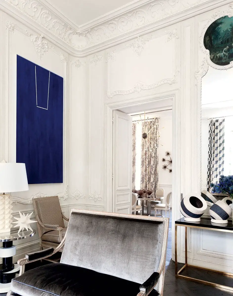 A historic French apartment designed by François Catroux with a fresh mix of modern and traditional elements on @thouswellblog.