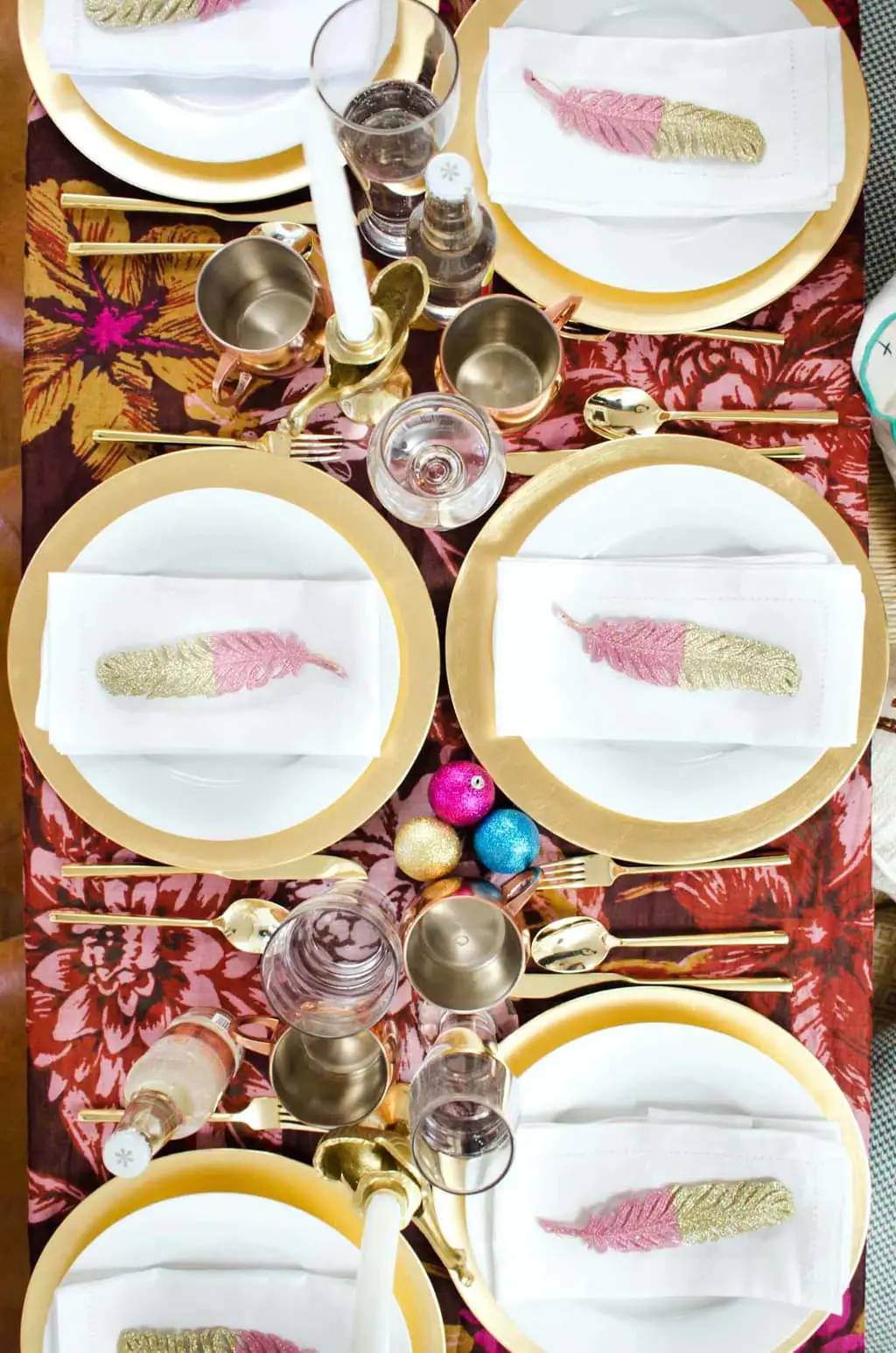 Bright whimsical holiday table setting on @thouswellblog