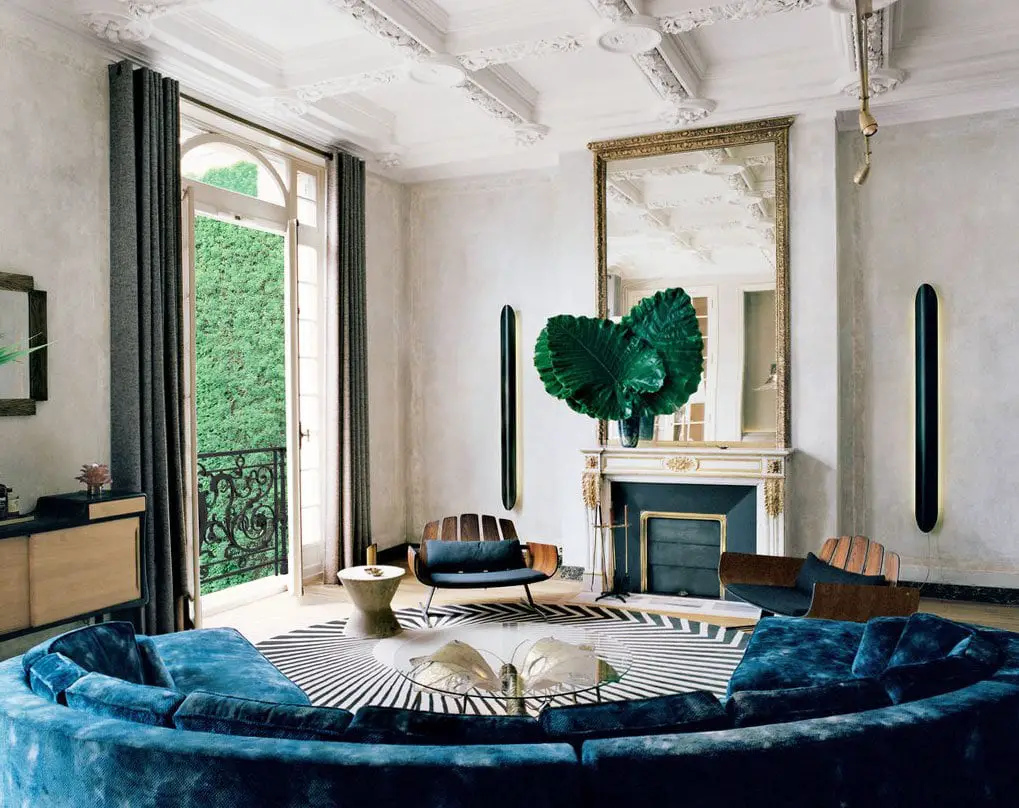 A sophisticated modern living room in an ornate Parisian apartment on @thouswellblog