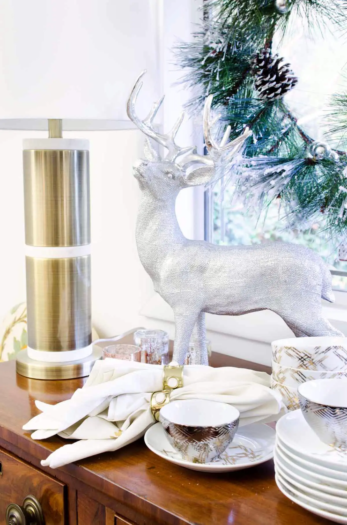 Silver reindeer figurine, brass and marble lamp, and entertaining essentials from @TargetStyle