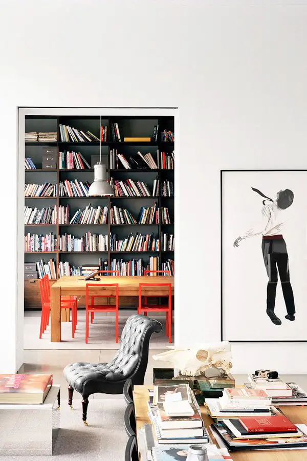 Modern living room and dining room with orange chairs via @thouswellblog