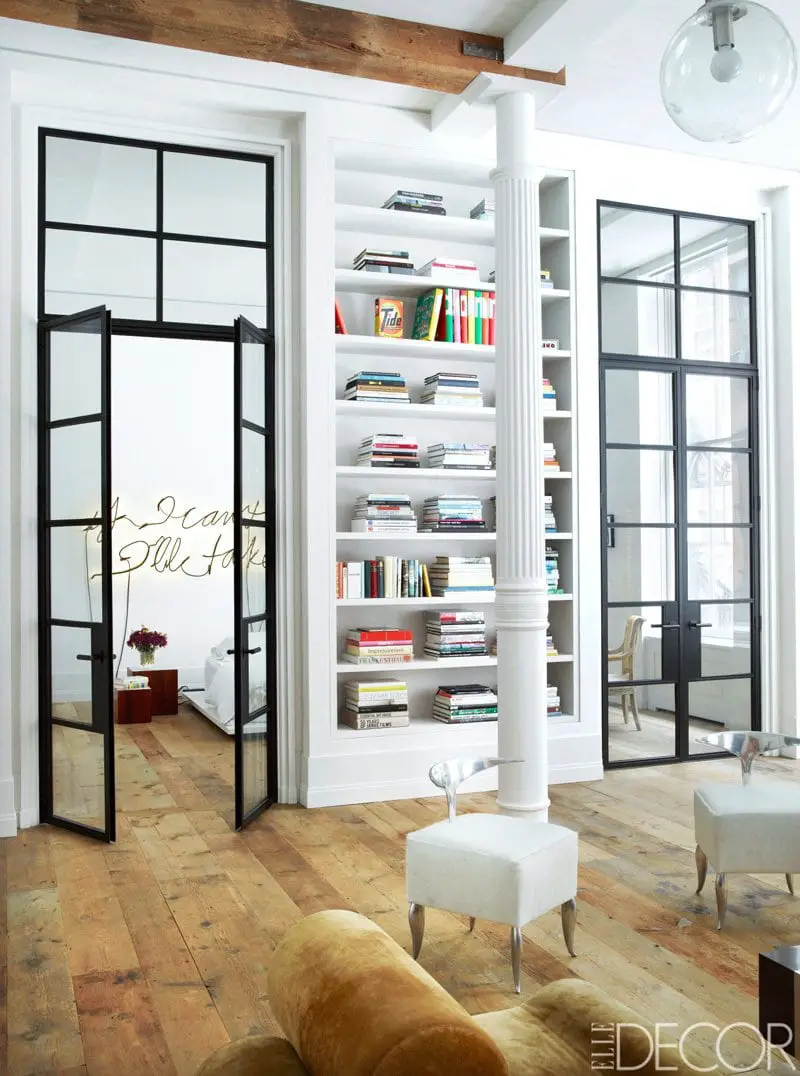 Metal and glass doors to the bedroom in a Manhattan loft via @thouswellblog