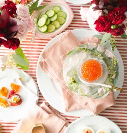 Salmon roe, floral ice bowl, and deviled egg Valentine's Day appetizer party table via @thouswellblog