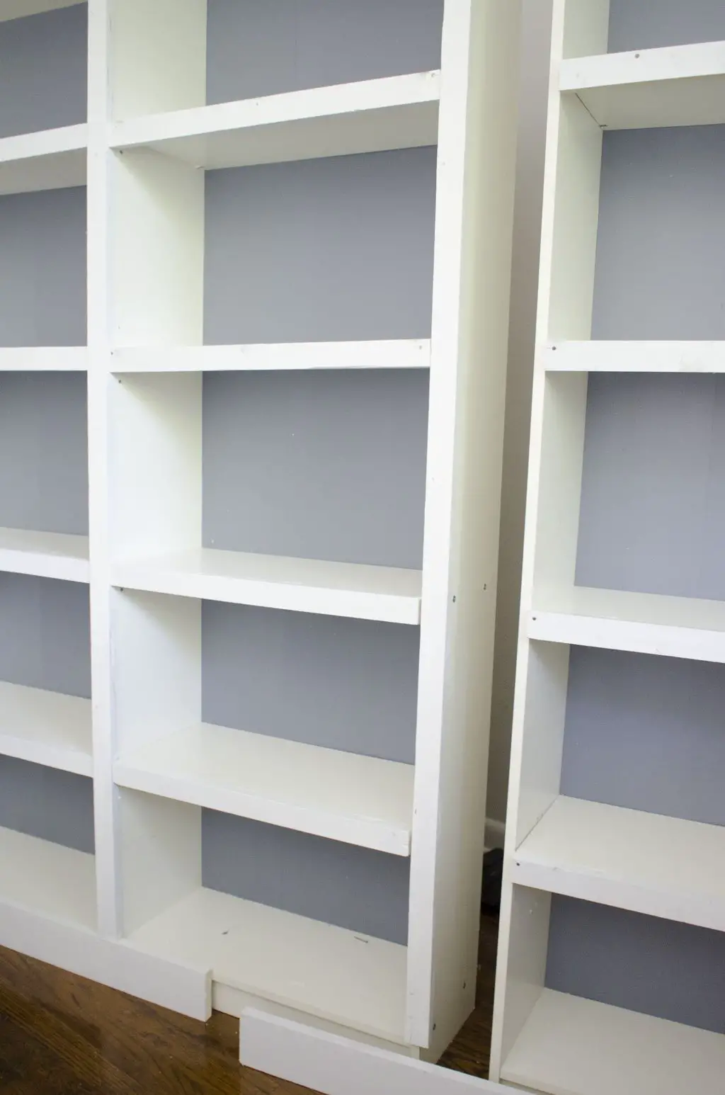 Built-in bookcases DIY Ikea hack on @thouswellblog