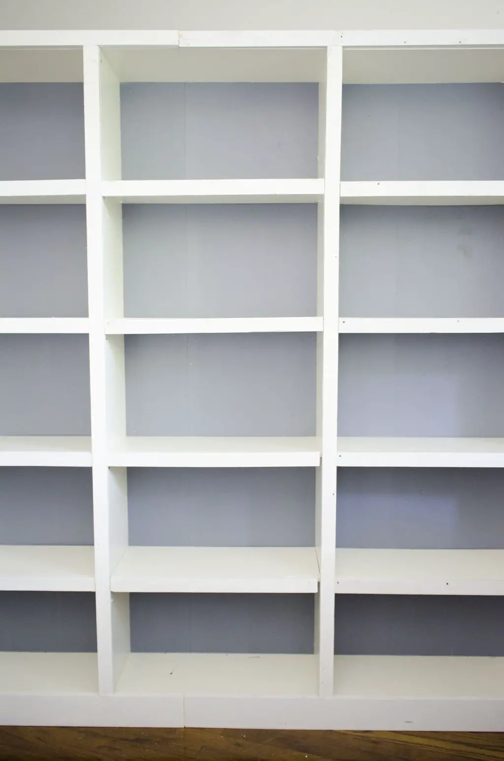 Built-in bookcases DIY Ikea hack on @thouswellblog