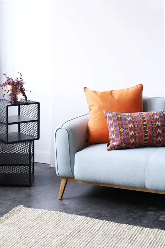 Pale blue sofa and mesh cube side tables from Furniture Maison via @thouswellblog