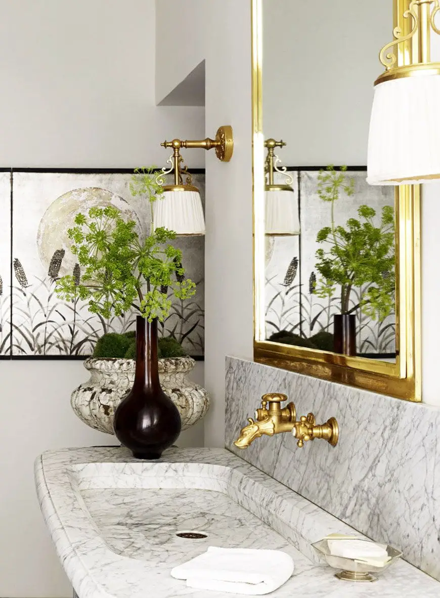 Marble and brass bathroom in a glamorous Paris apartment via @thouswellblog