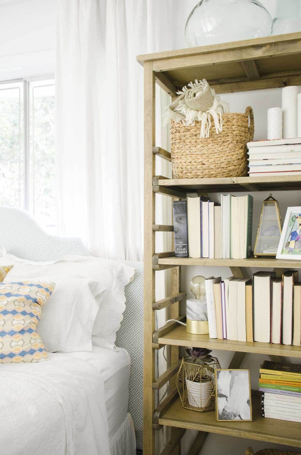 Bookshelf 2024 behind bed