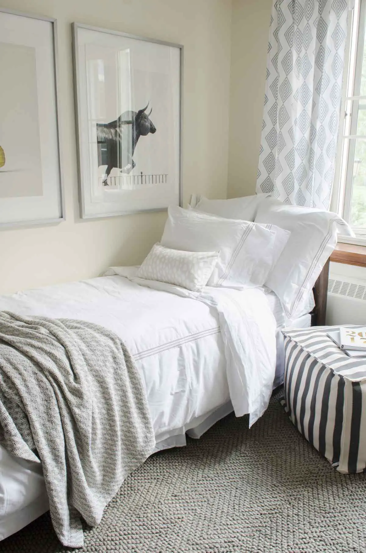 Dorm room decor essentials with bedding, pouf, art prints via @thouswellblog