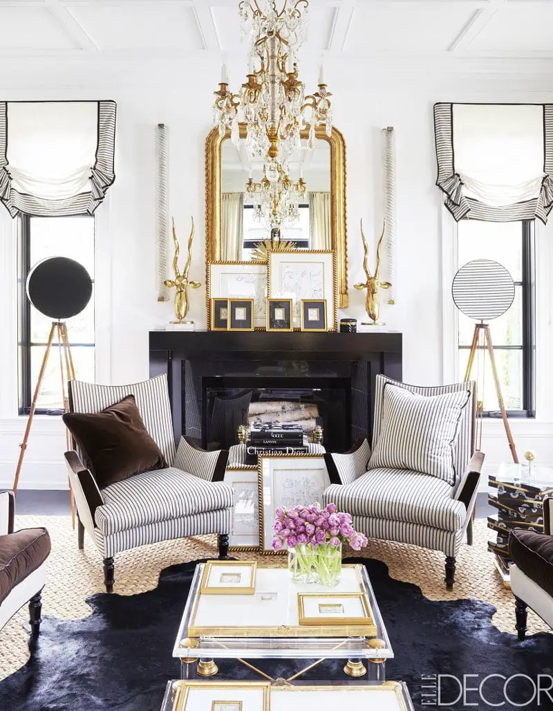 Black and white living room with glamorous gold accents via @thouswellblog
