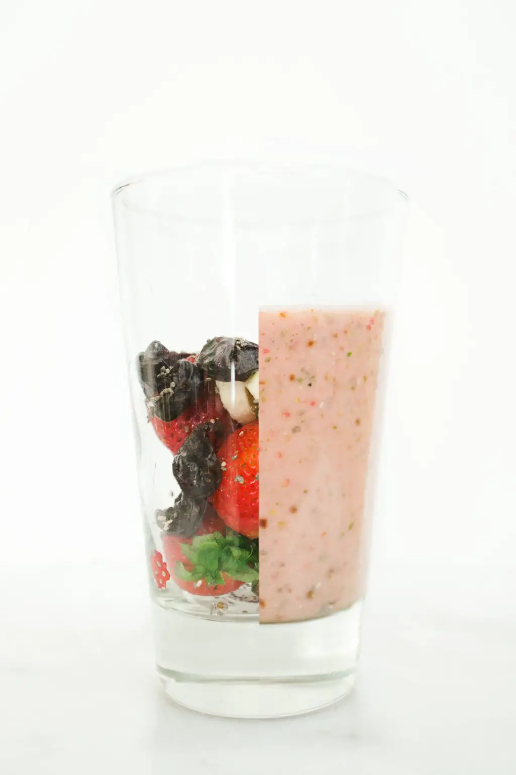 Pink smoothie recipe with strawberry, banana, cherry, chia seeds and Truvia nectar via @thouswellblog