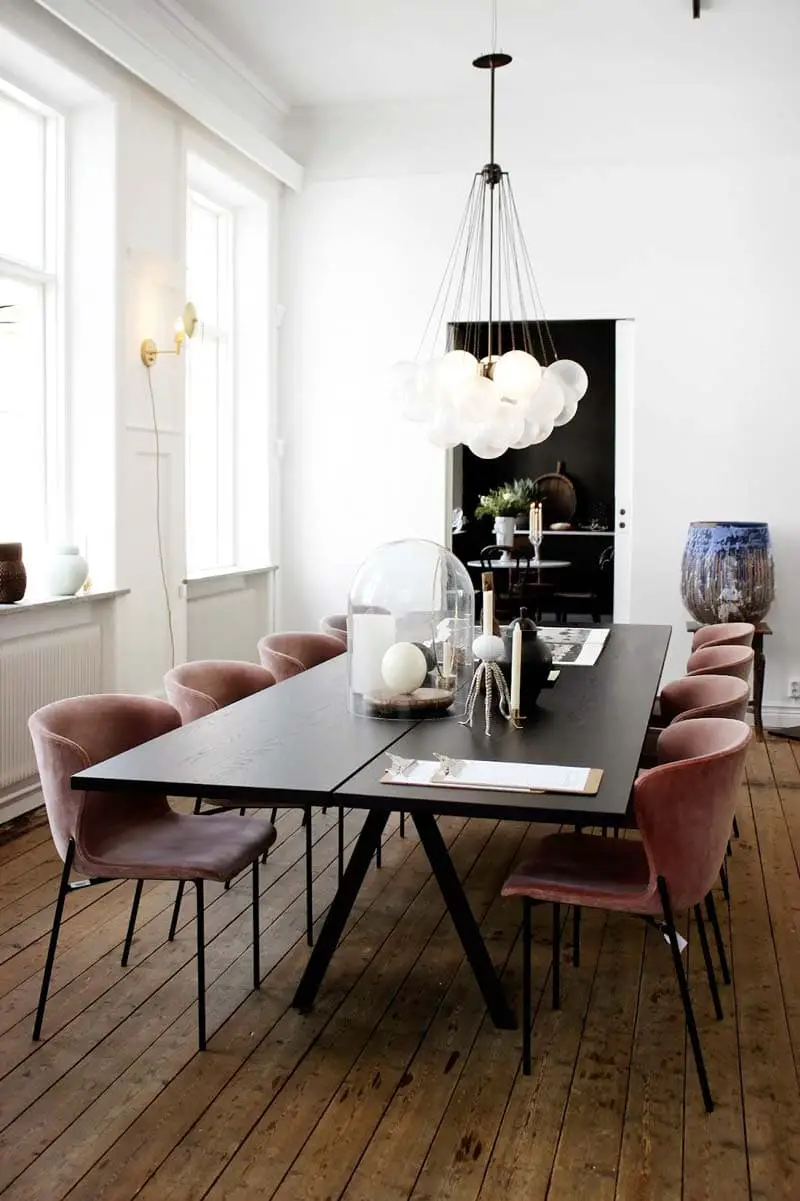 Modern European dining room with bubble chandelier via Thou Swell