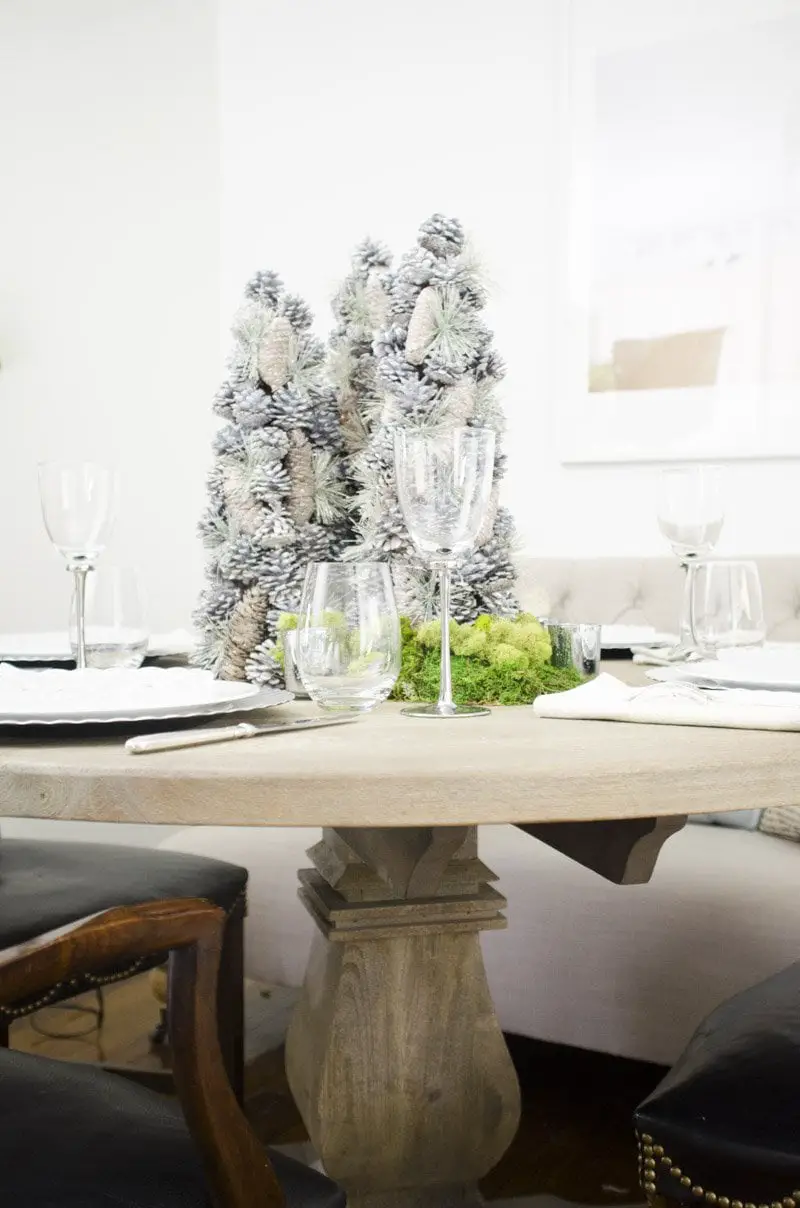 Simple silver holiday tablescape via Thou Swell