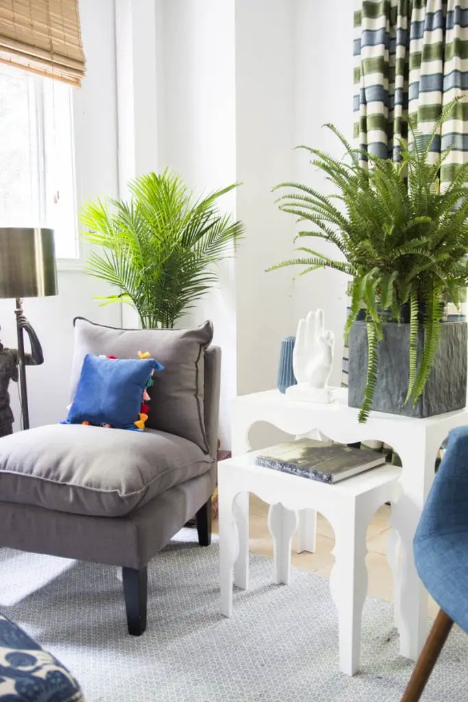 Blue green guest room with fern, palm, and Moroccan side tables on Thou Swell #blueandwhite #livingroom #guestroom #guestbedroom #homedecor