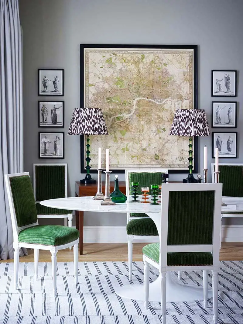 Eclectic dining room with green chairs and Saarinen tulip table on Thou Swell @thouswellblog