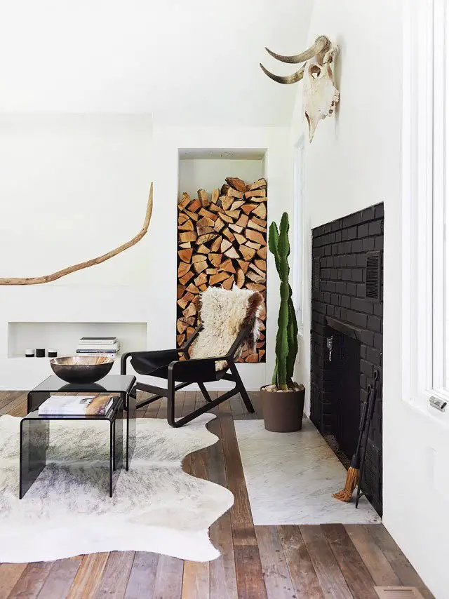 Scandinavian living room design with cowhide rug on Thou Swell @thouswellblog