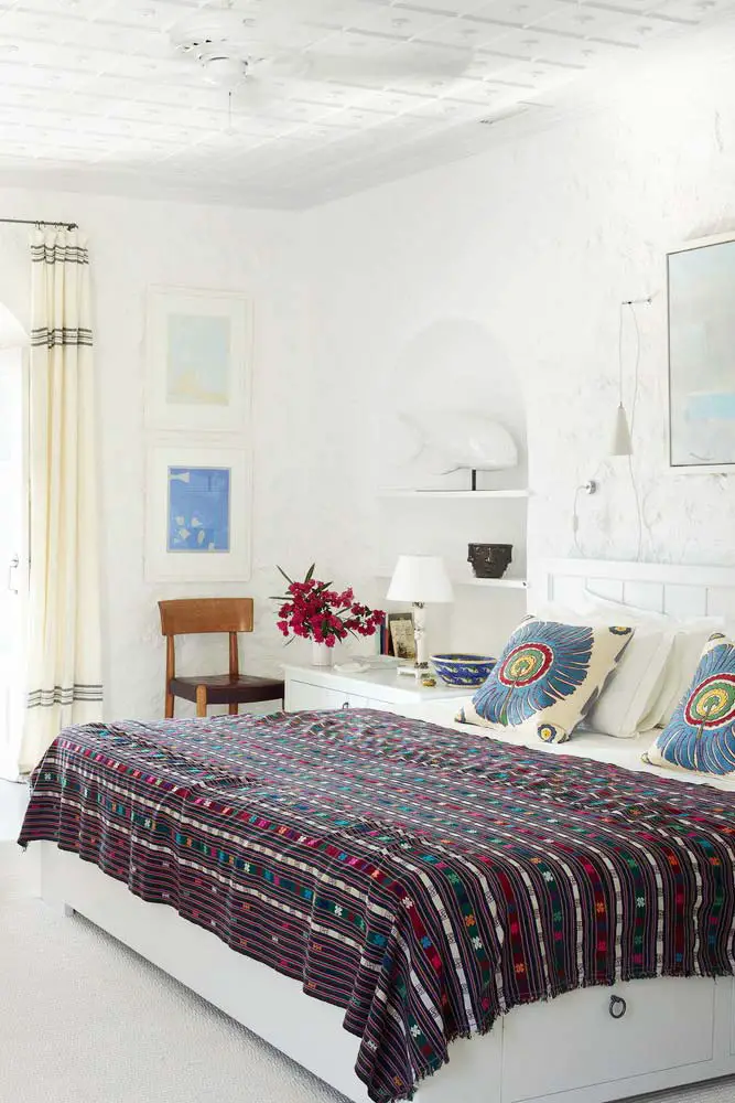 White coastal bedroom with Bhutanese fabric in Greece on Thou Swell @thouswellblog