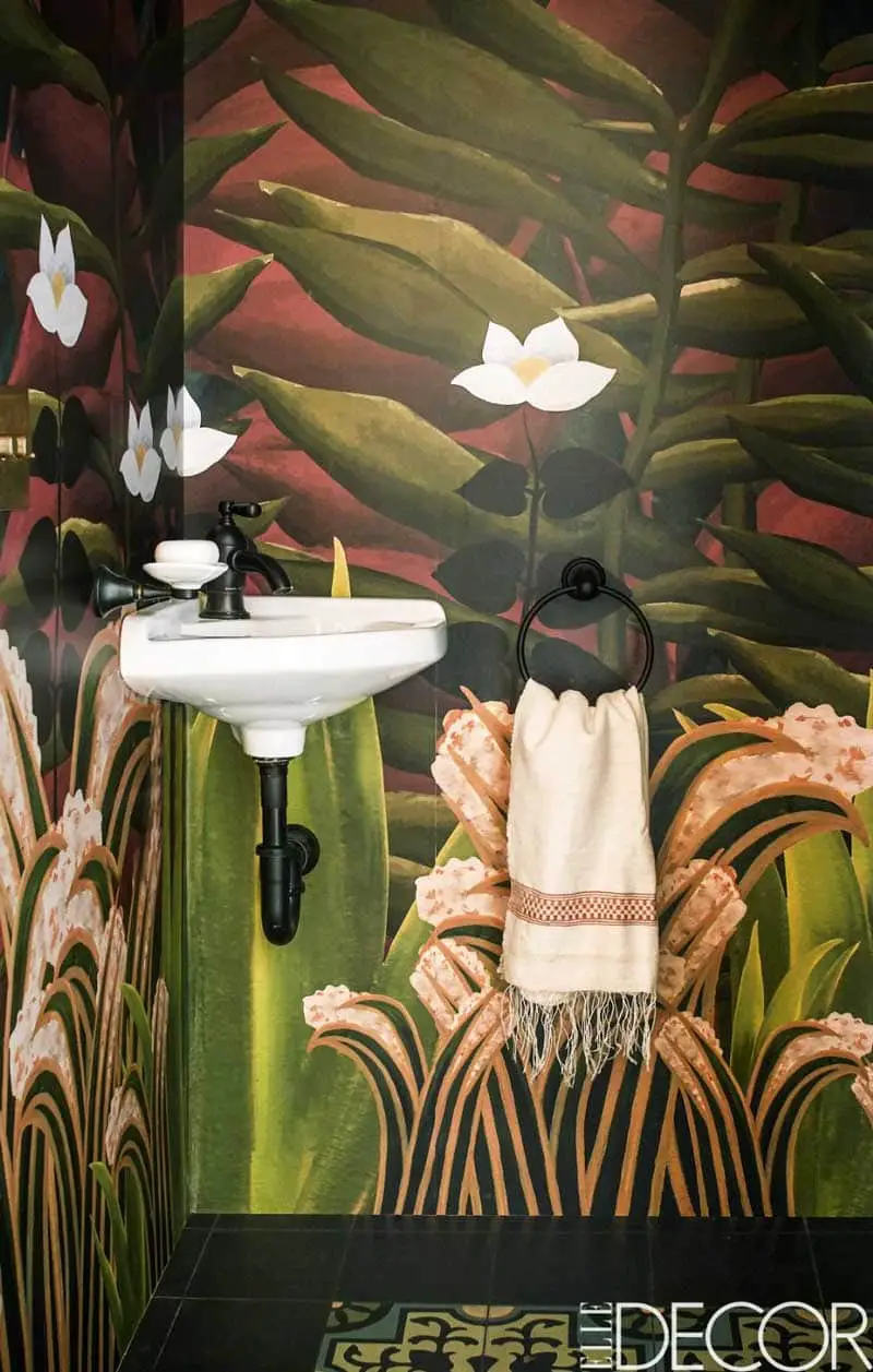 Wallpaper inspired by Rousseau jungle painting in small powder room on Thou Swell @thouswellblog