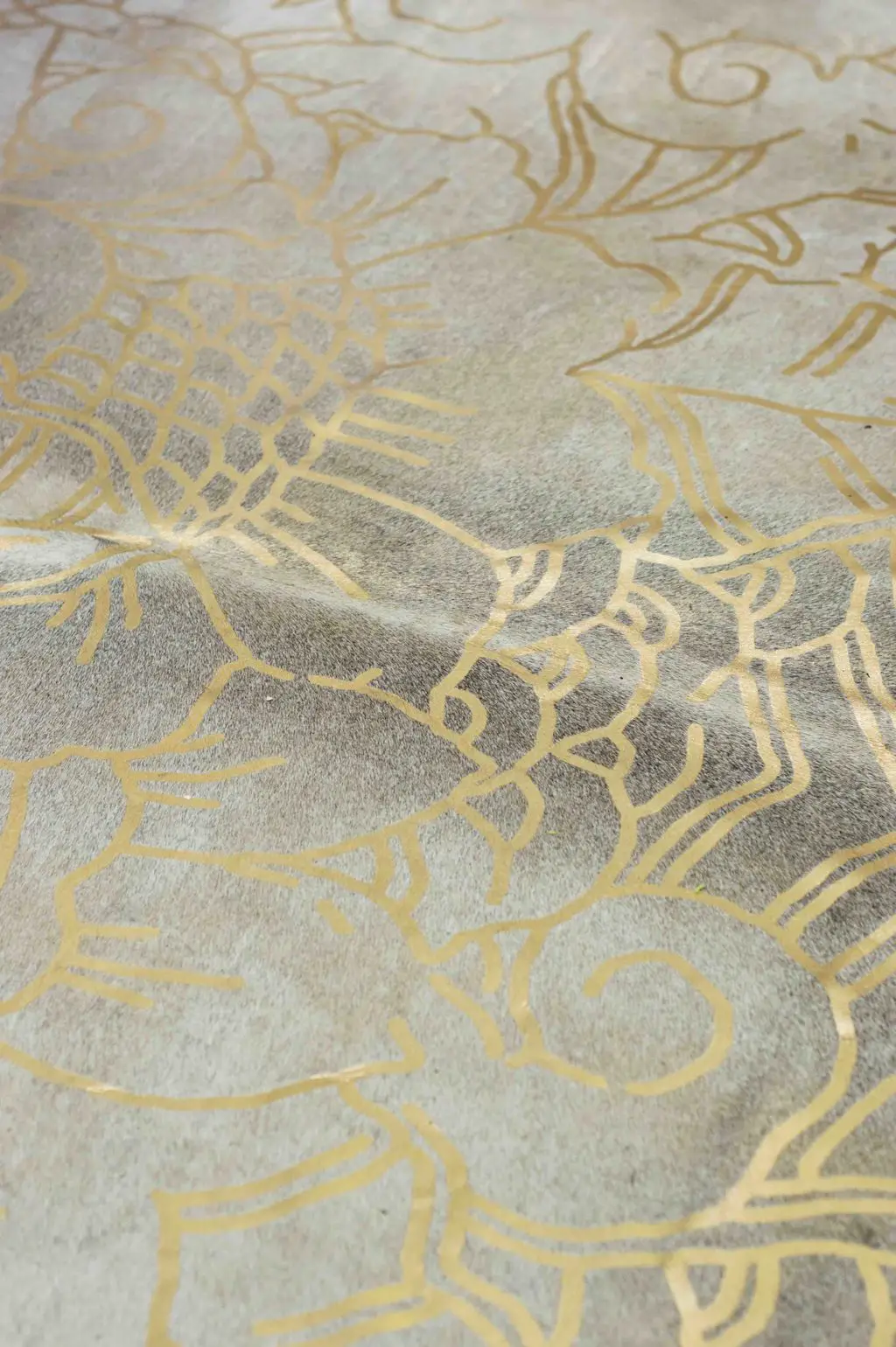 Hide rug with gold pattern on Thou Swell @thouswellblog