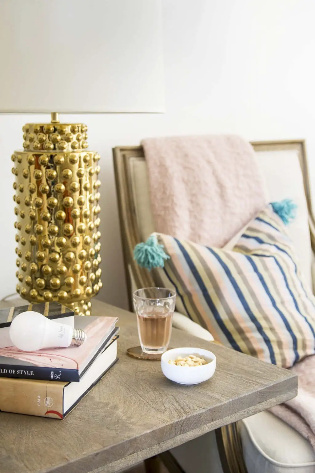 Living room vignette with Robert Allen gold hobnail lamp and Hive Active Light on Thou Swell @thouswellblog