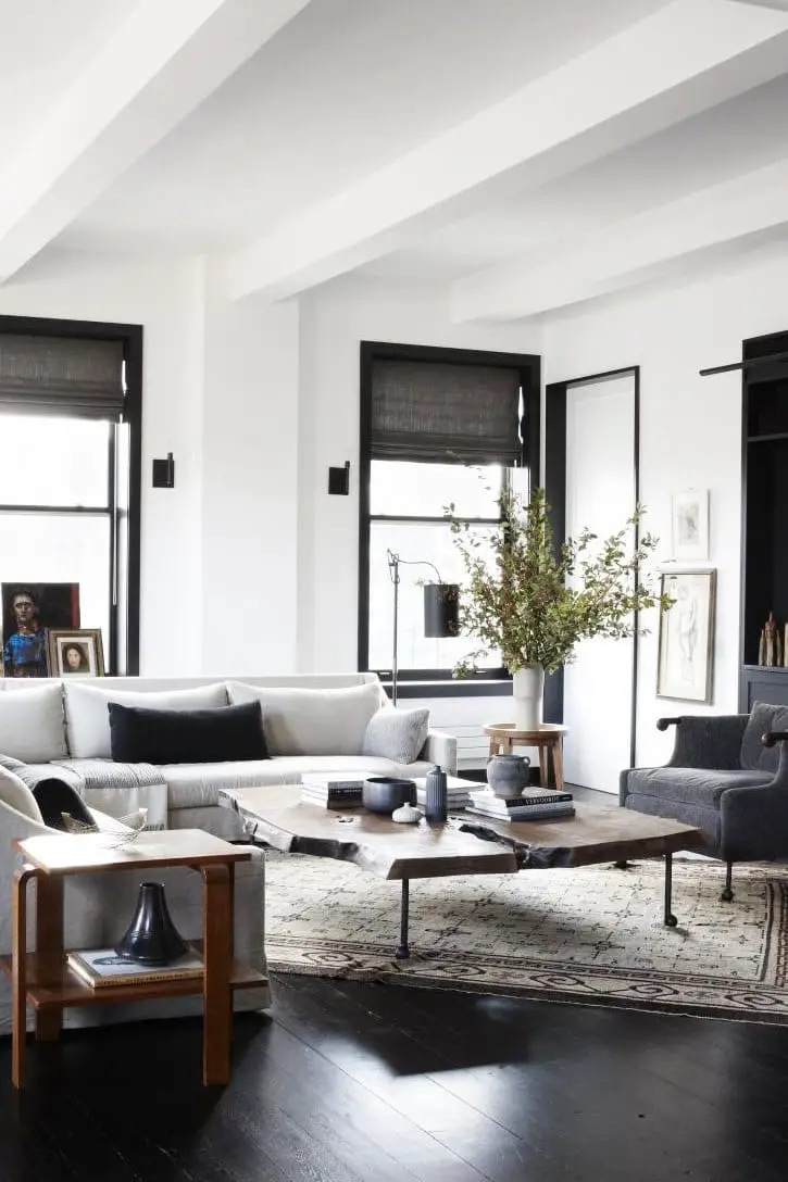 Neutral industrial modern living room in New York City loft on Thou Swell @thouswellblog