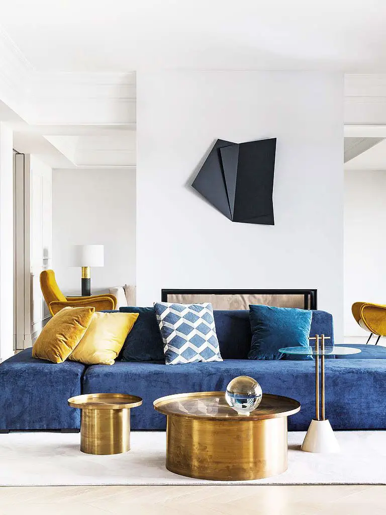 Glamorous blue and gold modern living room in Madrid on Thou Swell @thouswellblog