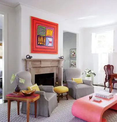 Colorful New Orleans living room with modern art and pink Karl Springer coffee table on Thou Swell @thouswellblog