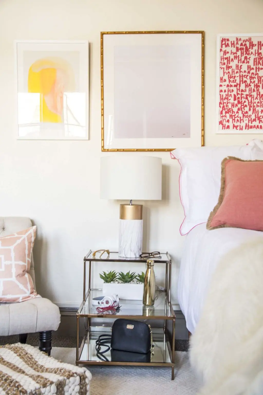 Pink and blush dorm room design with tufted slipper chair and gallery wall on Thou Swell @thouswellblog