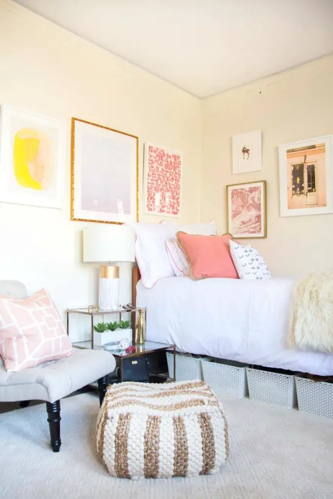 Pink and blush dorm room design with tufted slipper chair and gallery wall on Thou Swell @thouswellblog