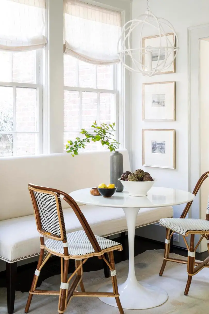Dining banquette with bistro chairs and tulip table on Thou Swell @thouswellblog