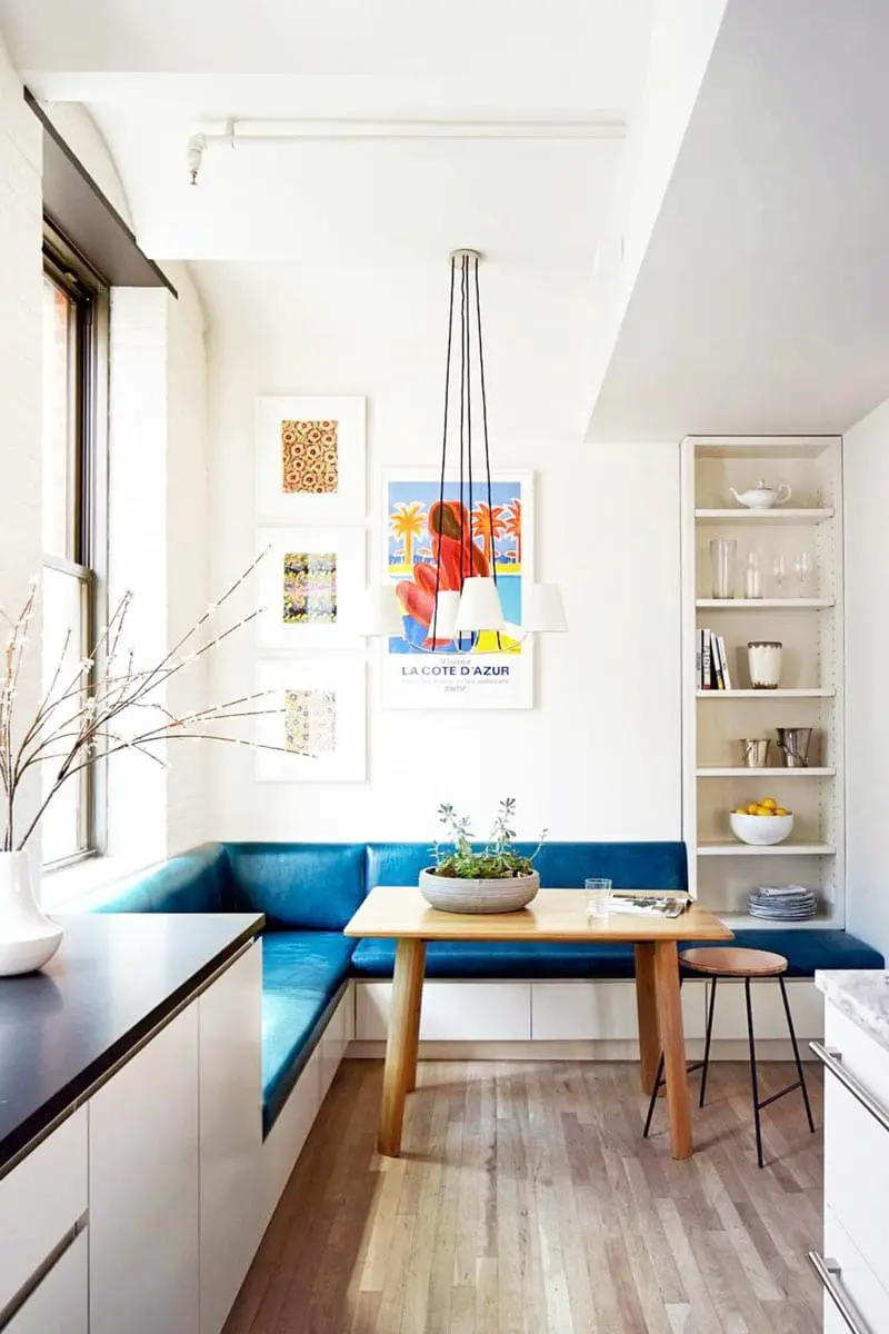 Blue dining banquette in modern kitchen design on Thou Swell @thouswellblog