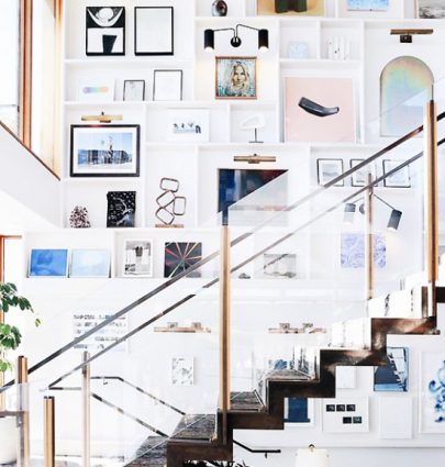 Huge gallery wall above a floating staircase in Soho House Malibu on Thou Swell @thouswellblog