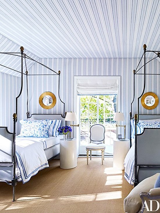 Blue striped twin bedroom with canopy beds on Thou Swell @thouswellblog