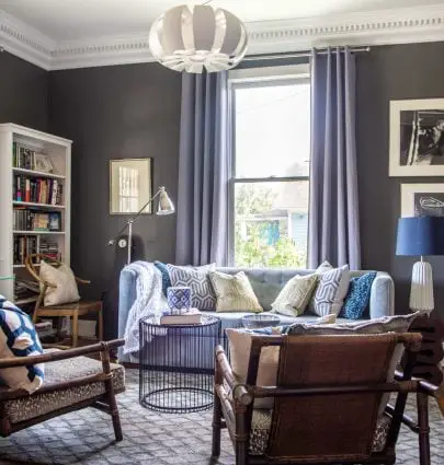 Gray and blue living room in Atlanta, GA with modern and vintage mix on Thou Swell #livingroom #livingroomdesign #greyroom #greylivingroom #greypaint #interiordesign #homedesign #homedecor #interior #design