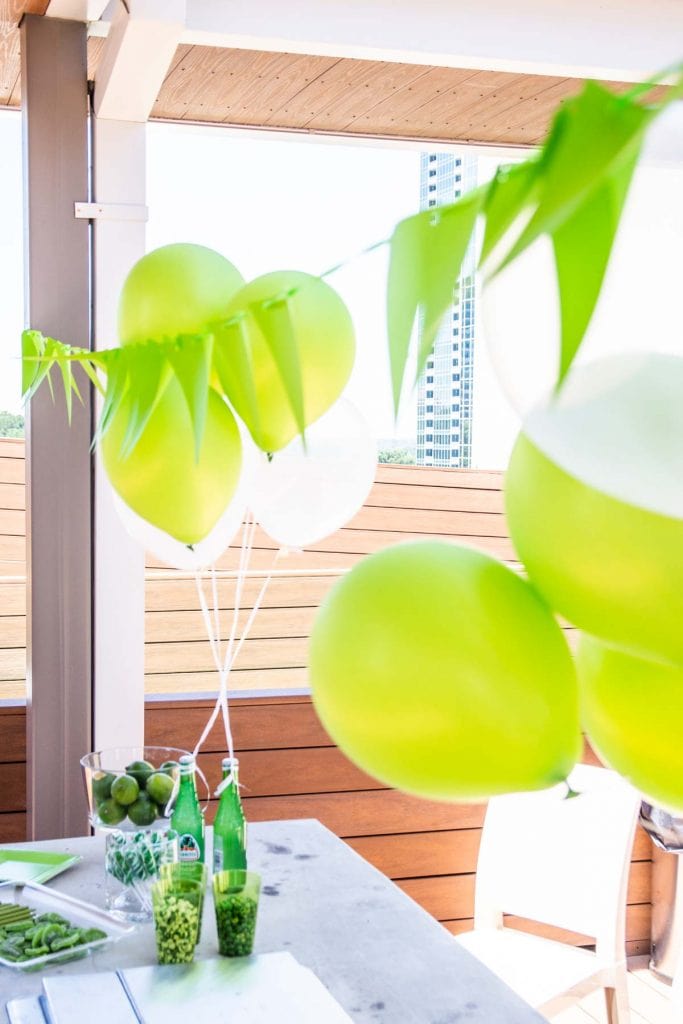 Green and white bubbly birthday party with Balloon Time helium tank on Thou Swell @thouswellblog