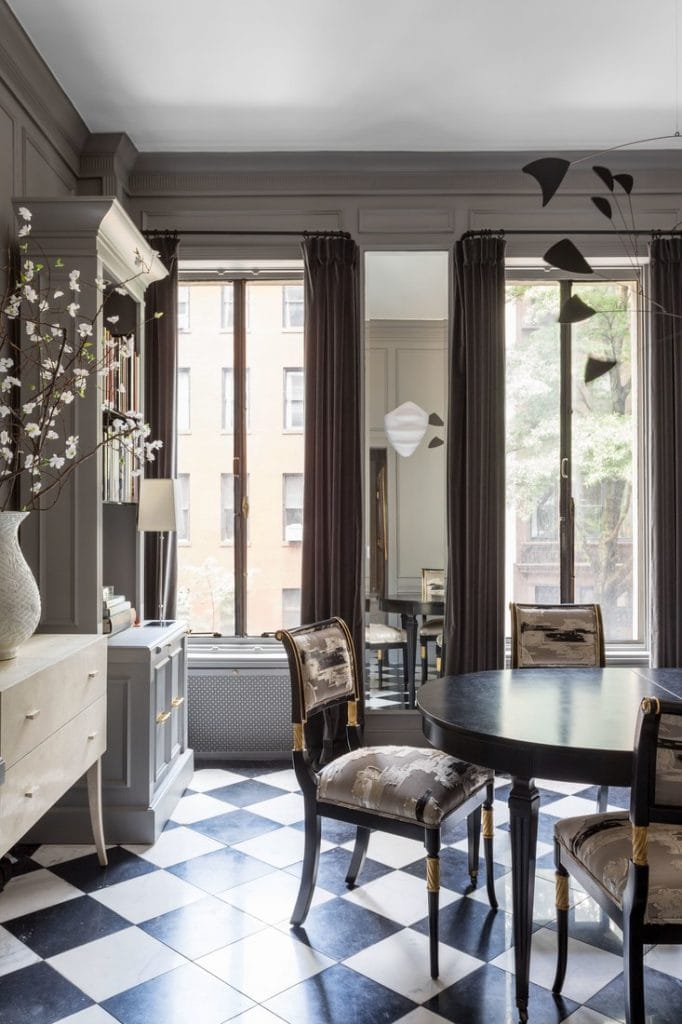 Beautiful black and white marble checkerboard floor in Ryan Korban townhouse dining room on Thou Swell @thouswellblog