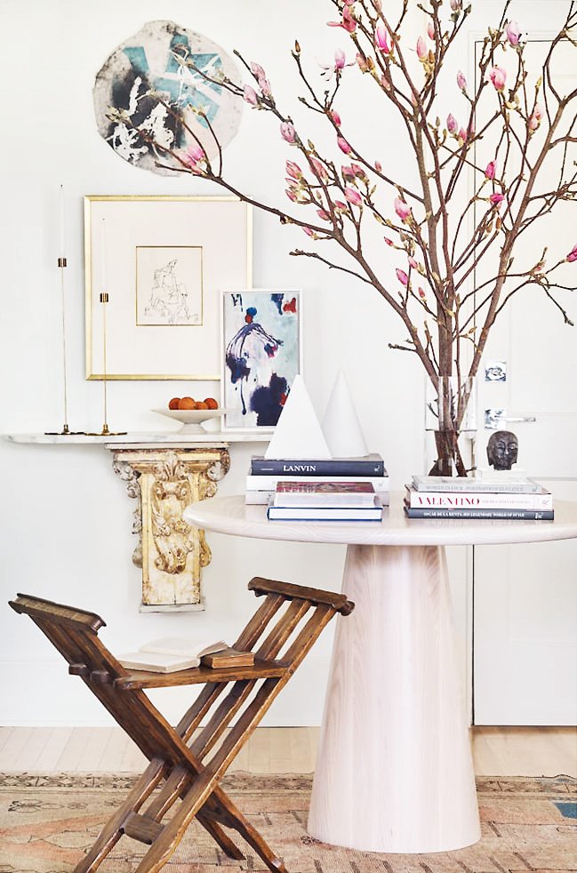 Round entry table with antique floating console table in Atlanta home entryway on Thou Swell @thouswellblog