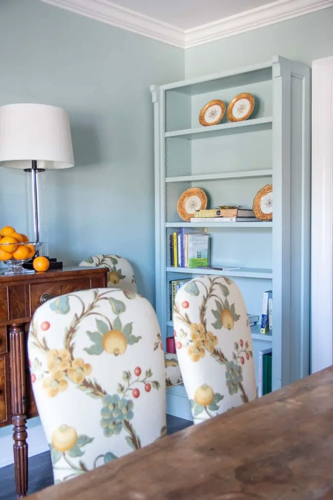 Clare paint light blue Headspace dining room walls and painted bookshelf on Thou Swell @thouswellblog