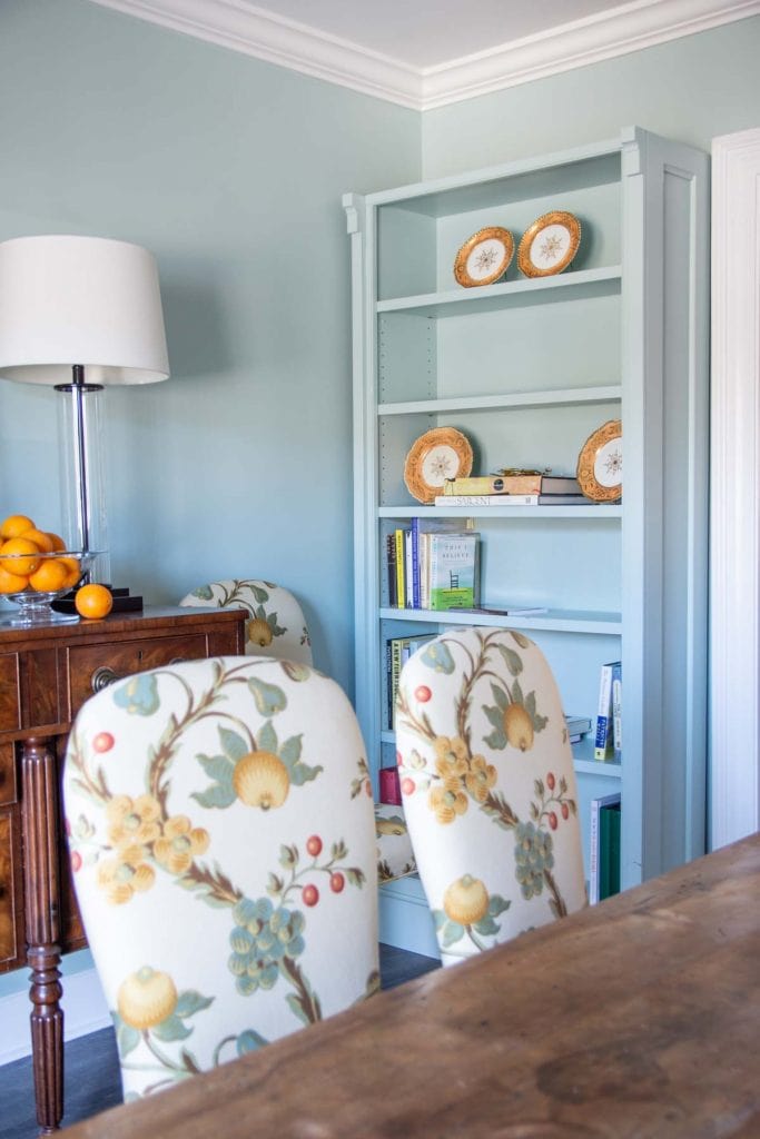 Clare paint light blue Headspace dining room walls and painted bookshelf on Thou Swell @thouswellblog