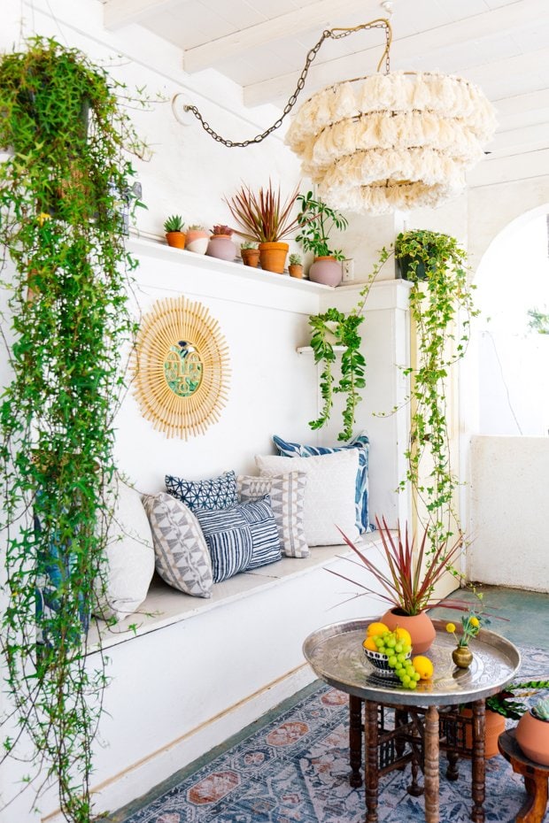 Inside Out performance fabric design by Justina Blakeney, Jungalow sun room with bench pillows and plants on Thou Swell #fabricdesign #outdoorfabric #insideout