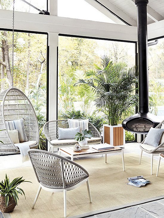 Midcentury modern sunroom with outdoor furniture by Ballard Designs on Thou Swell @thouswellblog #sunroom #homedecor #decor