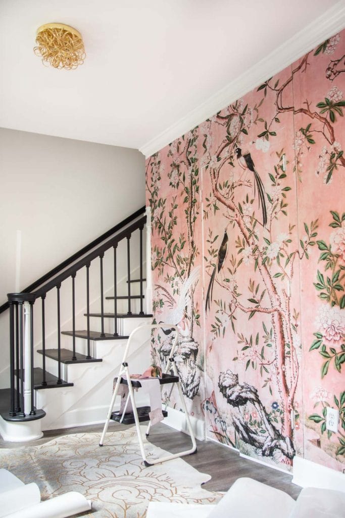 Pink floral landscape mural installation in entryway on Thou Swell #mural #muralinstall #wallpaper #wallpaperinstall #entryway