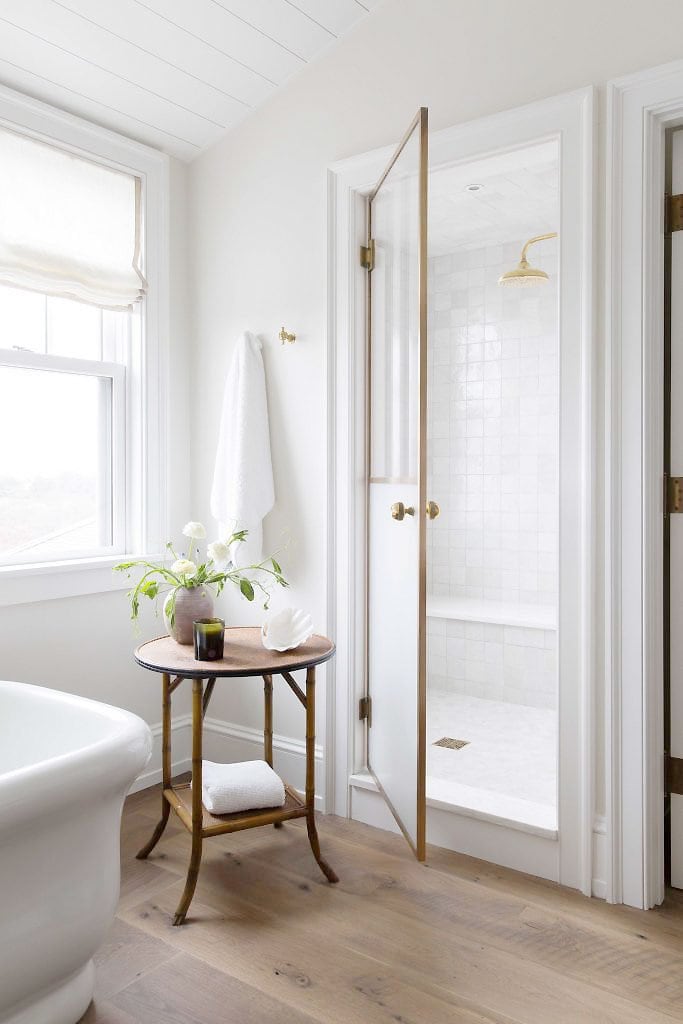 Classic white bathroom in Nantucket house by Katie Martinez on Thou Swell #bathroom #bathroomdesign #whitebathroom #classicbathroom