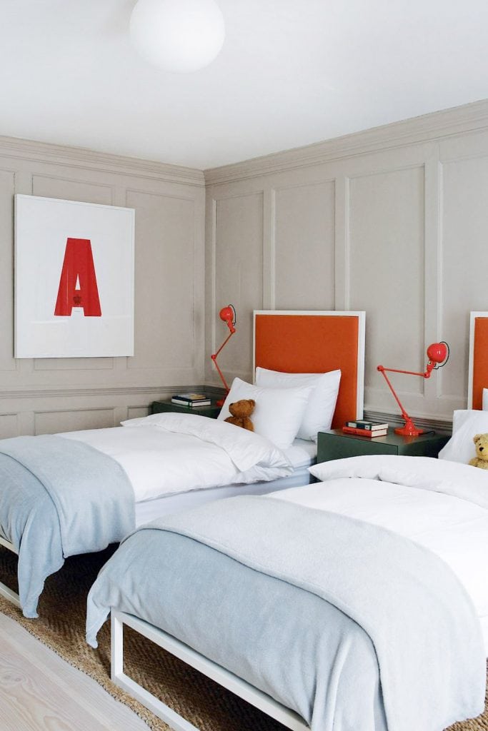 Red headboards in a twin bedroom with blue and white bedding on Thou Swell #twinbeds #twinbedroom #kidsbedroom #bedroomdesign #doublebeds #headboard #redheadboard #interiordesign