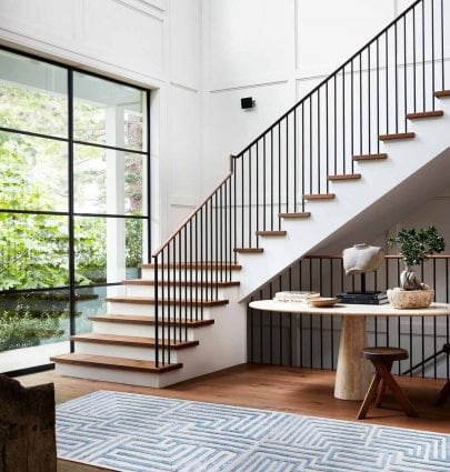 LATEST PINS x KFD LABYRINTH RUGS 1 Huge stair landing entryway design with iron balusters and blue Knossos maze rug runner in Sky by Kevin Francis Design on Thou Swell #arearug #rug #rugdesign #mazerug #maze #luxuryrug #tuftedrug #woolrug #patternedrug #homedecor #homedecorideas #luxurydesign