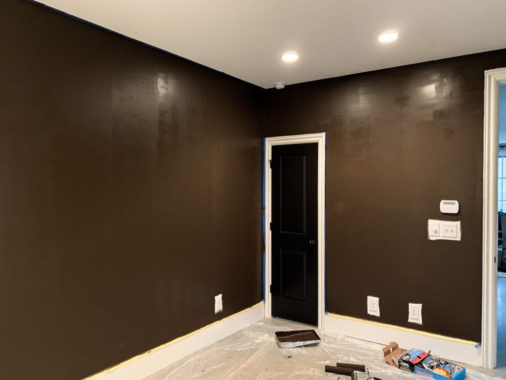 Behr Dark Truffle brown wall paint in apartment design on Thou Swell #behrpaint #darktruffle #brownpaint #brownwalls #darkbrown #apartment #apartmentdesign #wallcolor #wallpaint